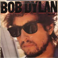 El 27 de octubre de 1983 Bob Dylan hizo el lanzamiento de su vigésimo segeso álbum de estudio.