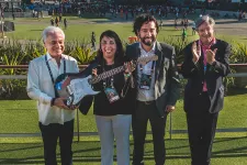 Roberto Medina presidente de Rock in Rio y representantes del gobierno chileno